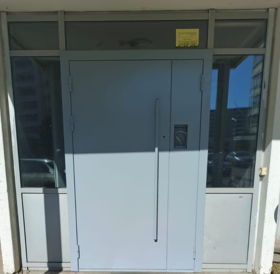 Металлические утеплённые двери — фото 17